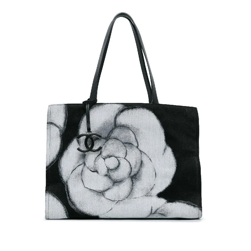 CHANEL bags with leather lining -Chanel Large Camellia Printed Canvas Shopper Tote (SHG-HCaliE)