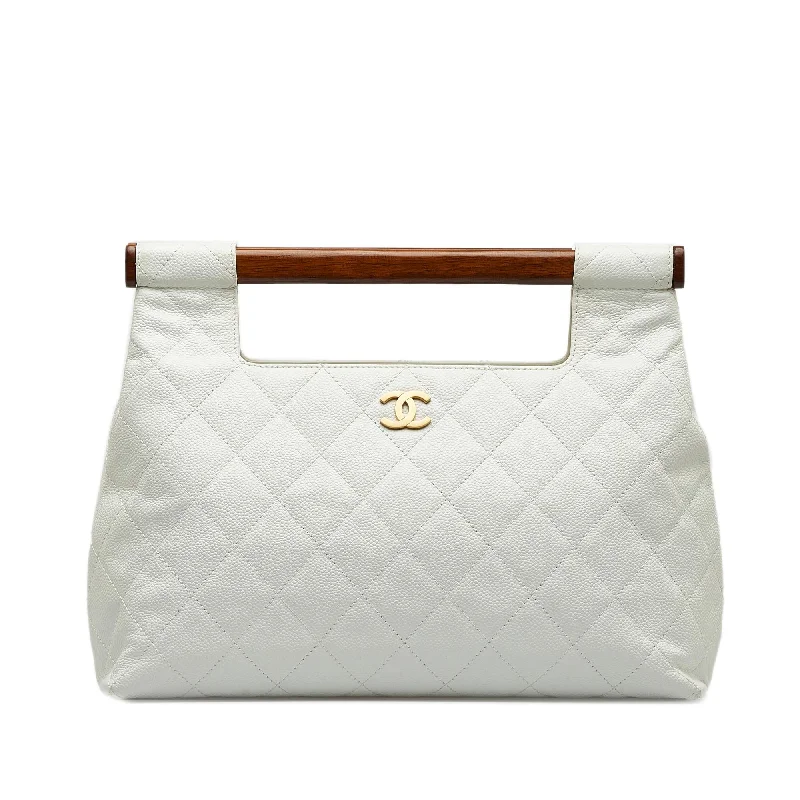 CHANEL bags with unique textures -Chanel Quilted Caviar Wood Handle Tote Bag (SHG-McC69J)