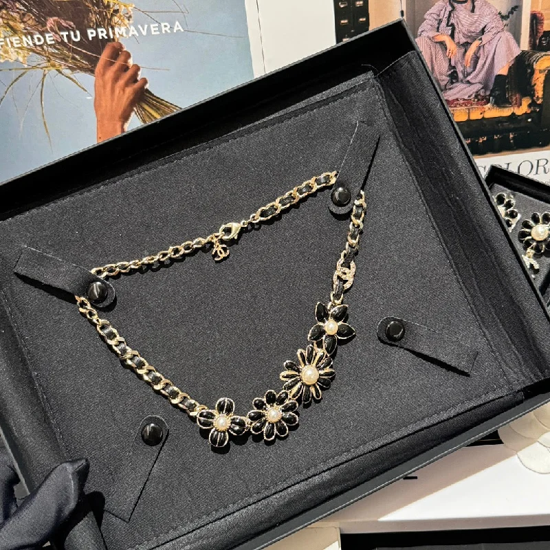 Exclusive CHANEL jewelry for special occasions -Chanel 24k Sun Flower Black Enamel Necklace XLC118