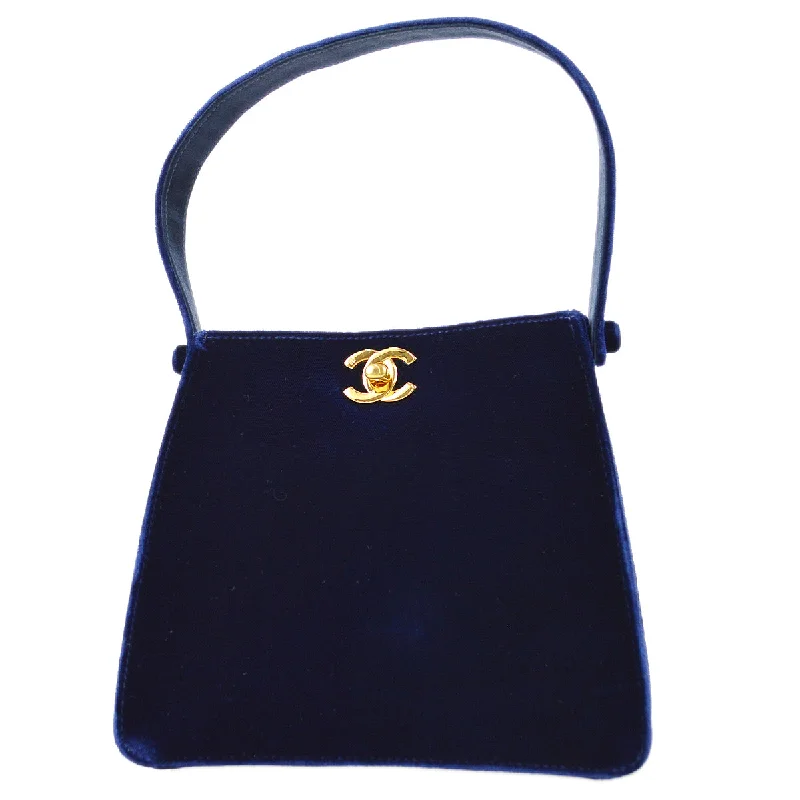 CHANEL bags with creative design details -Chanel * 1997-1999 Double Sided Turnlock Handbag Mini Blue Velvet