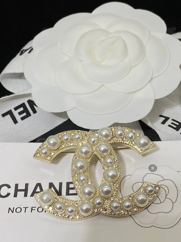 CHANEL watches with round faces -Chanel 100th anniversary pearl brooch