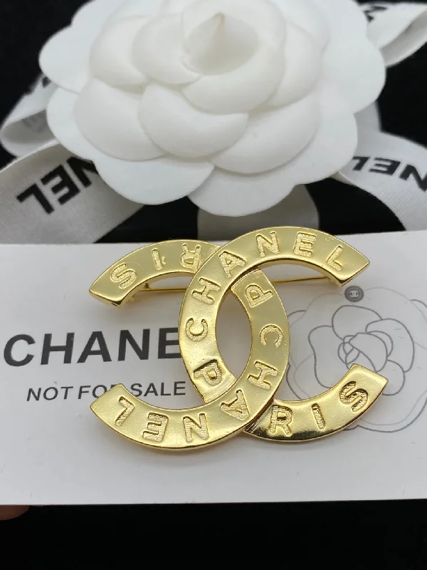 CHANEL rings with statement designs -CHANEL Chanel cc brooch