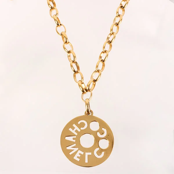 CHANEL jewelry with gold hardware -CHANEL Round Cutout Logo Plate Necklace