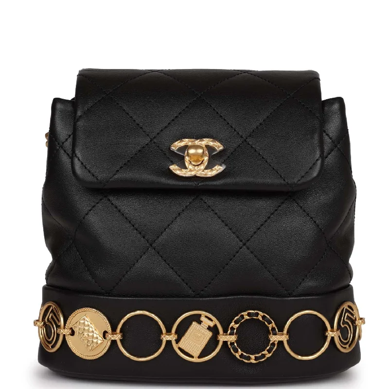 Popular CHANEL handbags in black -Chanel Small Charm Backpack Black Calfskin Aged Gold Hardware