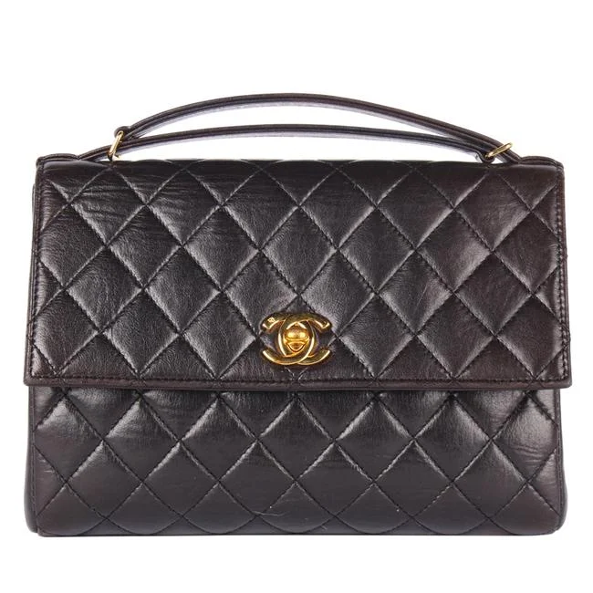 Designer CHANEL bags with fashion-forward look -Quilted Lambskin Leather Top Handle Satchel (Authenticity Date Code)