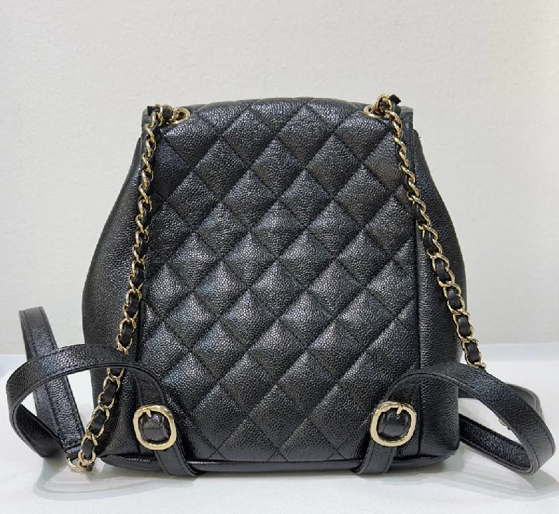 Timeless CHANEL bags with modern accents -Chanel 23P Small Shiny Caviar Quilted Duma Pockets Drawstring Backpack Black GHW