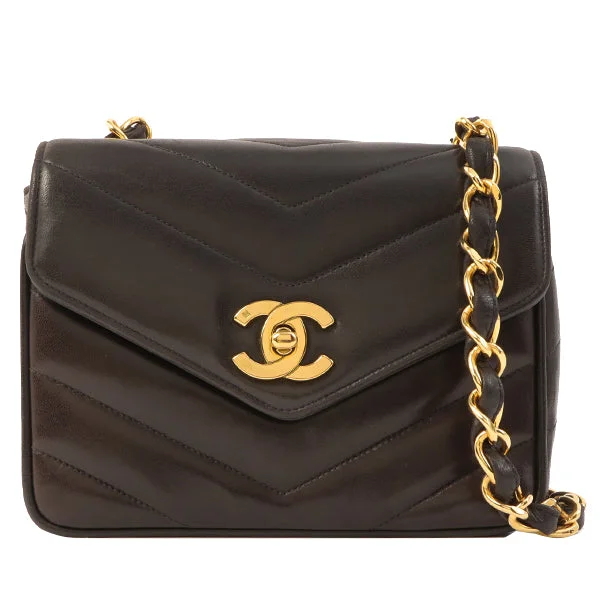 CHANEL mini flap bags -Chanel Around 1995 Made Chevron Stitch V Flap Turn-Lock Chain Bag Black