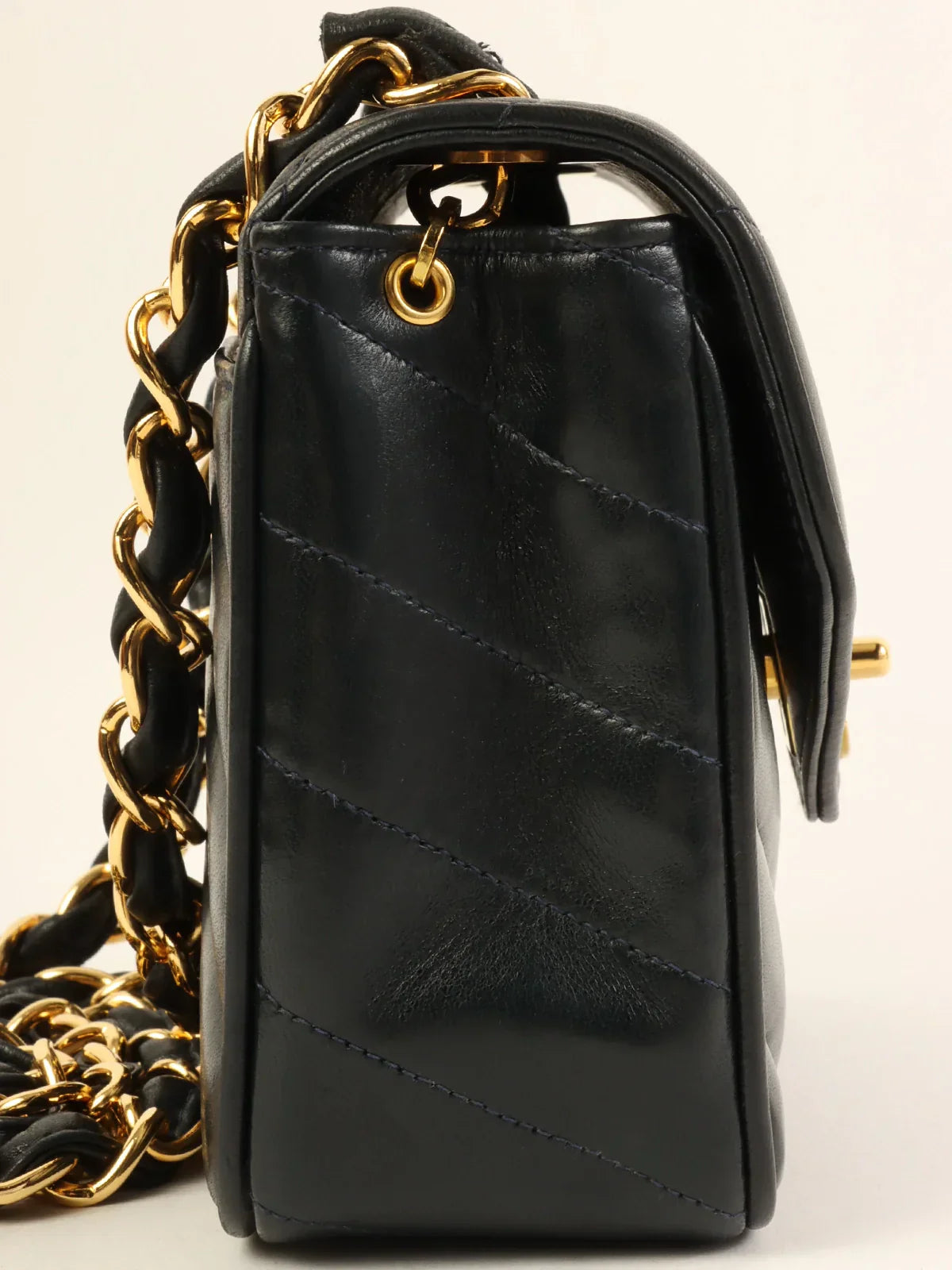 New CHANEL bag designs for 2025 -CHANEL Around 1995 Made V Stitch Turn-Lock Chain Bag Black