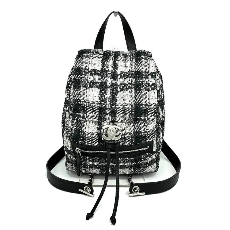 Vintage CHANEL bags for sale -Chanel Backpack Coco Mark Nylon Tweed Pattern Black x White Silver CHANEL