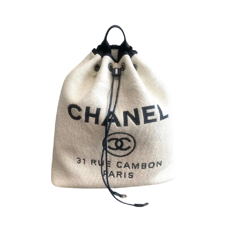 CHANEL Boy bag collection -Deauville Canvas Backpack in Creamy White Raffia & Navy Blue Calfskin Leather