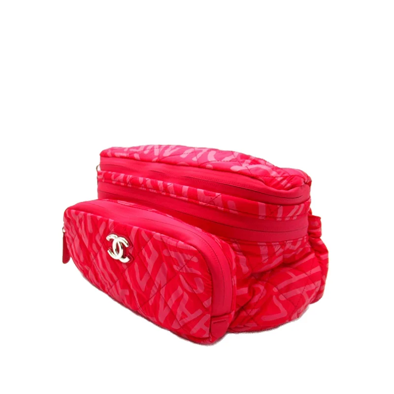 CHANEL bags in various colors -CHANEL Printed Nylon Coco Neige Convertible Backpack