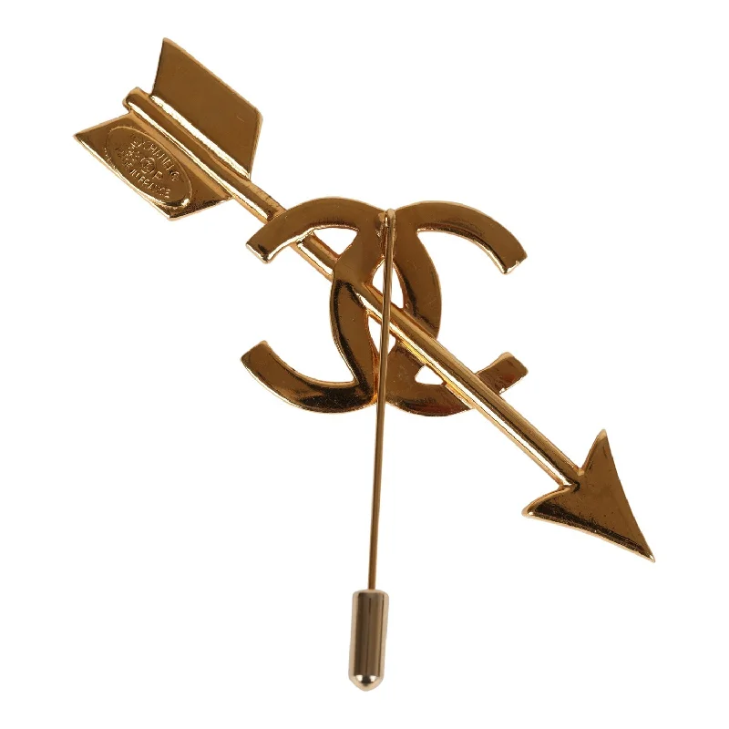 CHANEL accessories with gold-plated finishes -Vintage Chanel CC Bow and Arrow Brooch Gold Metal